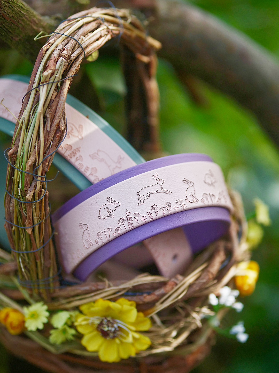 Hare embossed dog collar styled in spring wreath with flowers
